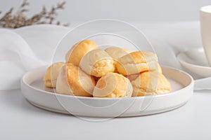 Fresh milk eclair in white plate