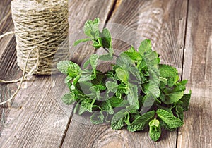 Fresh mint on the old wooden table