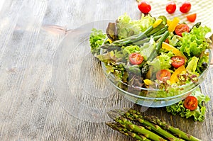 Fresh mix salad with green asparagus for healthy snack
