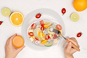 Fresh mixed fruit salad in bowl of salad