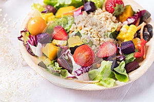 Fresh mixed fruits and vegetables salad, Healthy vegan food