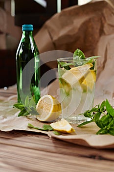 Fresh mojito with lemons and mint in glass