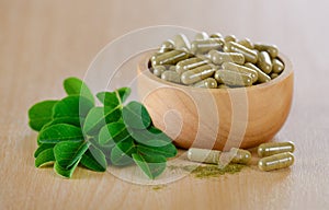 Fresh Moringa leaves and capsules Herbs for health