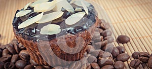 Fresh muffins with chocolate, coffee and dried sliced almonds. Dessert for different occasions