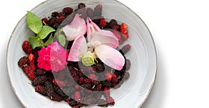 Fresh mulberry,rose and lotus in bowl