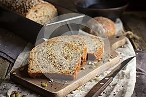 Fresh multigrain bread on rustic background