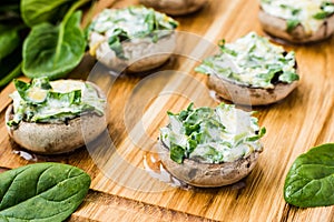 Fresh mushrooms with spinach and cheese