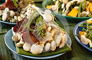 Fresh mushrooms and vegetables on market stall for sale in Chiang Mai local market, Thailand,