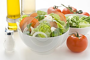 Fresh natural salad bowl tomato lettuce onion