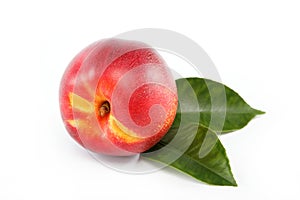 Fresh nectarin on a white.