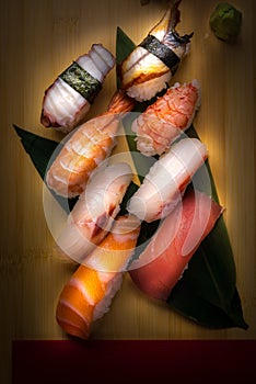 Fresh nigiri sushi in a plate in a japanese restaurant