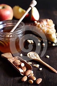 Fresh nuts on the table for breakfast with honey