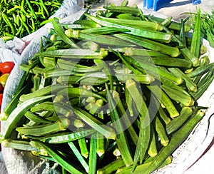 Fresh okra or Abelmoschus esculentus in a bamboo basket