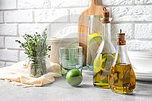 Fresh olive oil and kitchen utensils