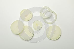 Fresh onion slices on white background, top view