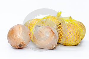 Fresh onions in a plastic net