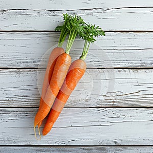 Fresh orange carrot presented elegantly on a white wooden background