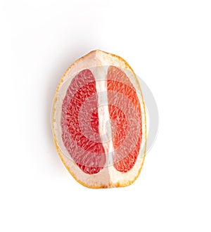 Fresh orange cut grapefruit half and slices isolated on white background