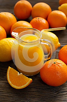 Fresh orange juice in the glass jug