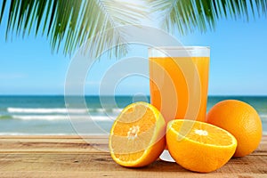 Fresh orange juice with oranges and blur beach background.