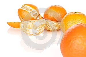 Fresh orange mandarin isolated on white