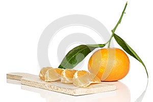 Fresh orange mandarin isolated on white