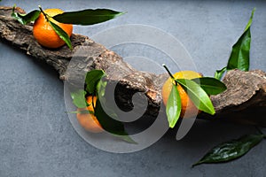 Fresh orange tangerine with green leaves