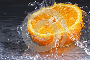 Fresh orange , water splash
