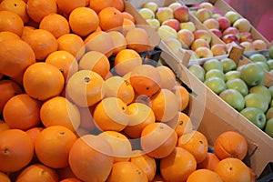 Fresh oranges and apples