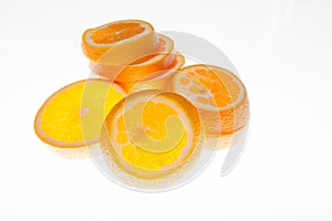 Fresh oranges cut into thin slices. I thirst for cool.