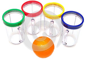 Fresh oranges and empty juice glass