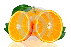 Fresh oranges fruit with half of orange and leaves