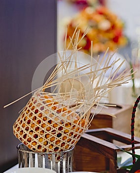 Fresh oranges in round bamboo basketThai Style photo