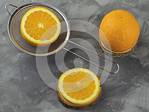 Fresh oranges on a rustic table for making juice