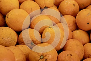 Fresh oranges in the super market. Close up