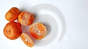 fresh oranges white background. orange fruit. orange slices, vitamin c.