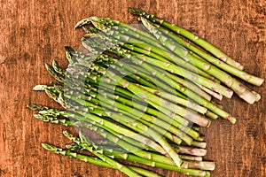 Fresh organic Asparagus close up on wooden background