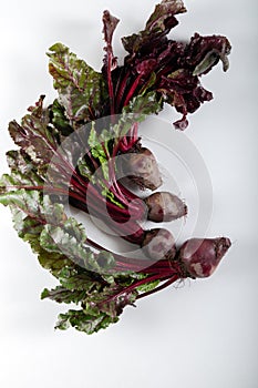 Fresh organic beetroots on white background. Top view.