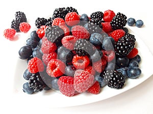 Fresh organic berry fruits isolated on white background