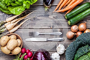 Fresh organic bio vegetables on wooden background