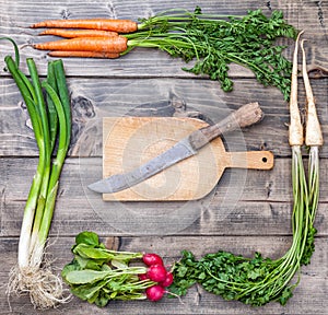 Fresh organic bio vegetables on wooden background