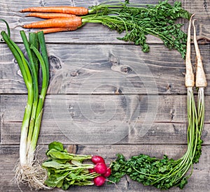 Fresh organic bio vegetables on wooden background