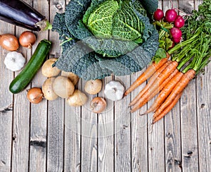 Fresh organic bio vegetables on wooden background