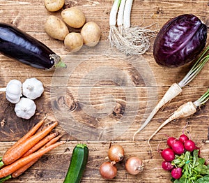 Fresh organic bio vegetables on wooden background