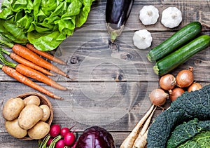 Fresh organic bio vegetables on wooden background