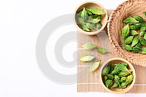 Fresh Organic bitter gourd or bitter melon in a bowl on white background