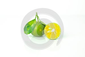 Fresh organic Calamansi lime on white background