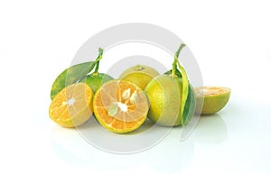 Fresh organic Calamansi lime on white background