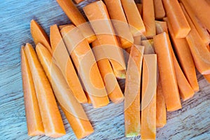 Fresh organic carrots sliced on the table