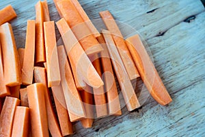 Fresh organic carrots sliced on the table